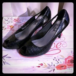 Black keyhole heels. Great shape, worn once.
